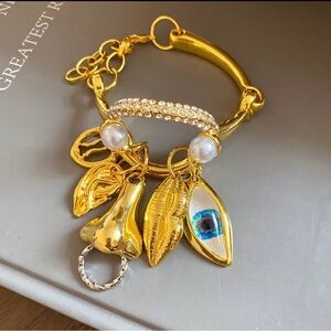 Schiaparelli Inspired facial feature Charm Bracelet